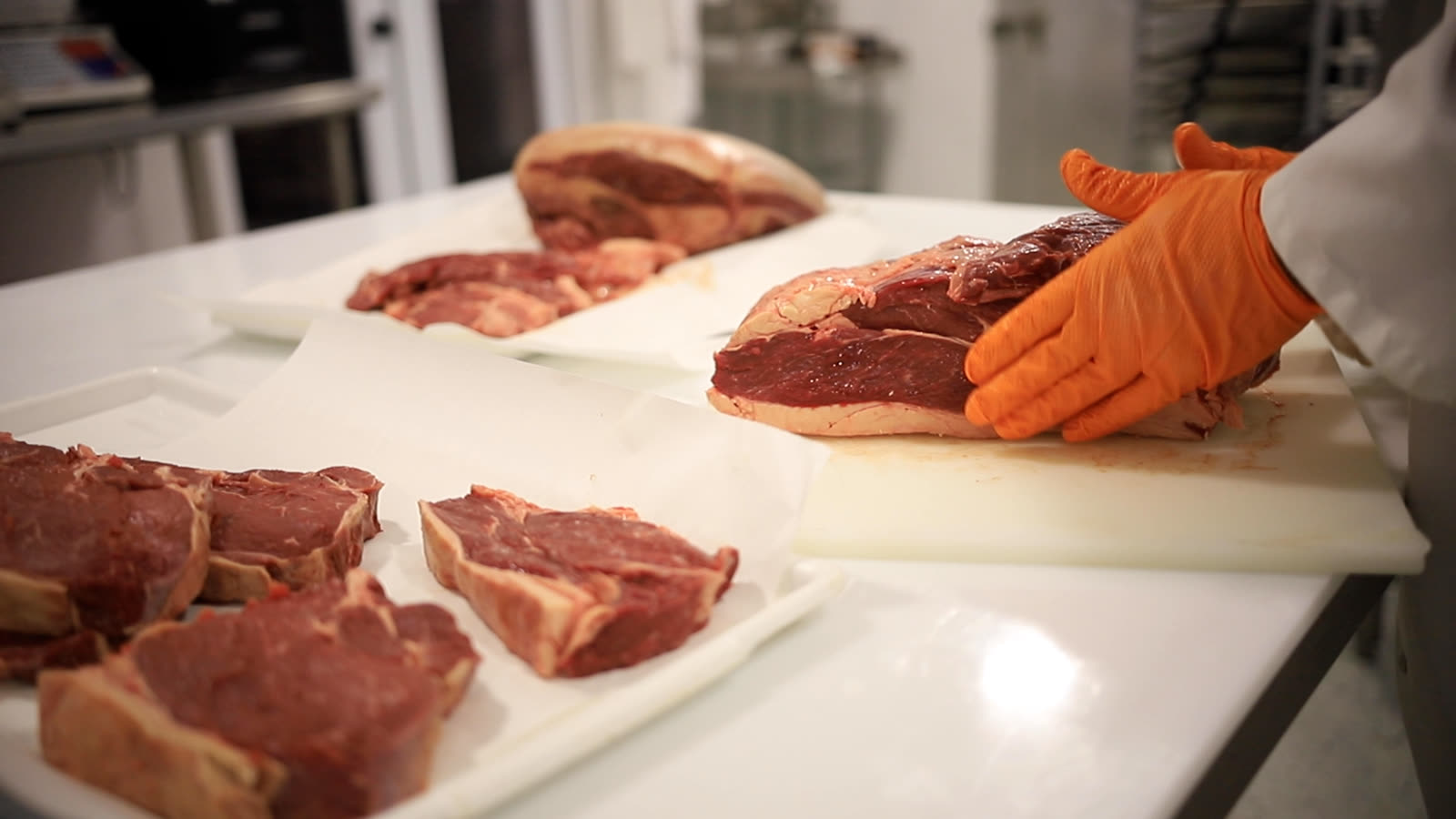Cutting steaks at Thousand Hills